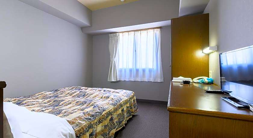 Tabist IWATA Station Hotel