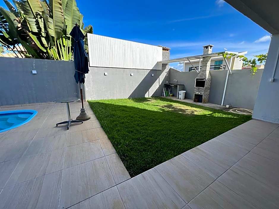 casa de praia com piscina para famílias