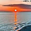 Pink Sunsets at the Palms of Destin Across from Beach, Heated Pool Shuttle & Dining