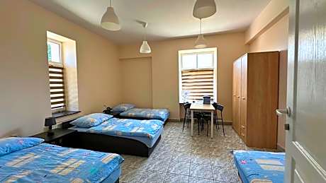 Quadruple Room with Shared Bathroom