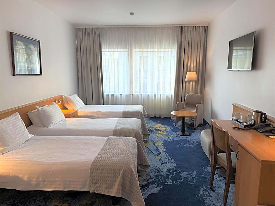 Photo 1 of 6 of Triple Room