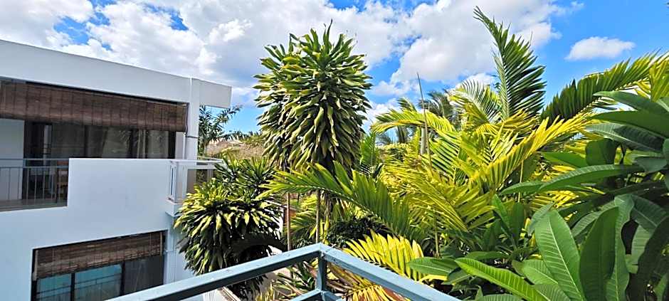 Villa Alizée - Boutique Hôtel Expérience - Idéal Couples & Pros - Piscine - Restaurant - Rooftop bar - Parking privé - 10min Port-Louis - Ambiance Tropical chic & authentique