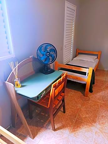 Single Bed in Dormitory Room