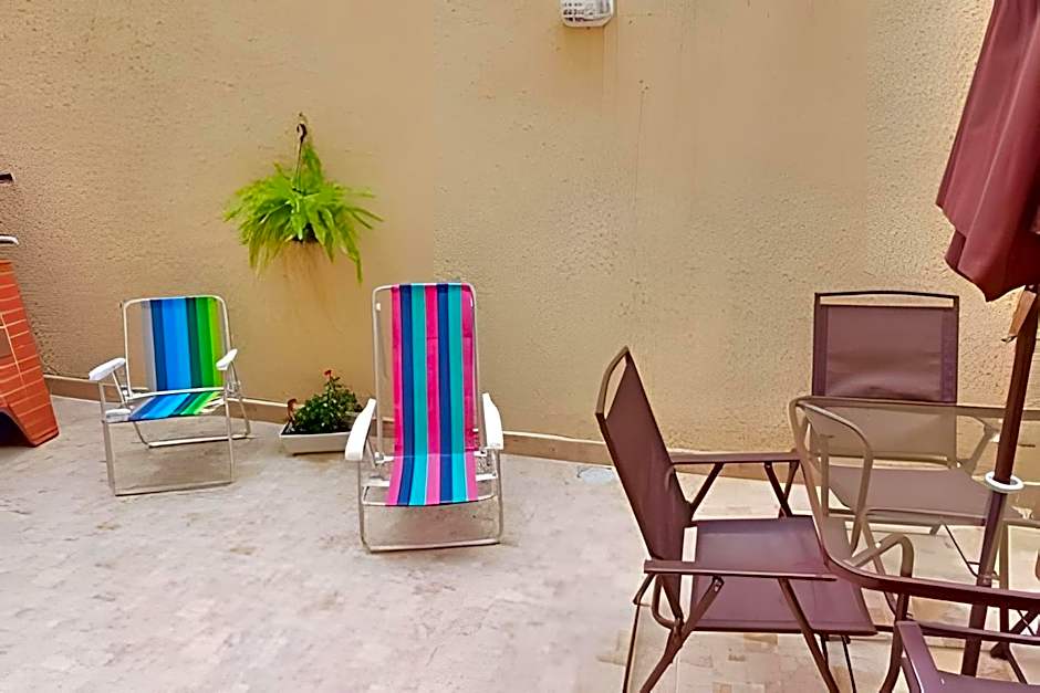 Studio pé na areia com área de churrasco privativa