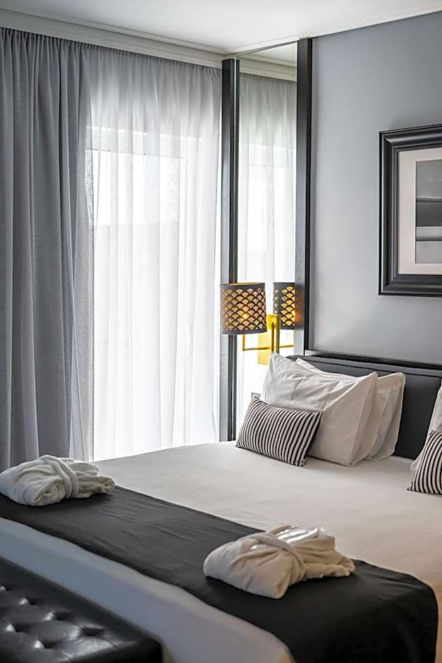 Athenian Riviera Hotel& Suites