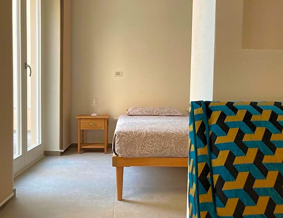 ClickSardinia Alghero Spectacular waterfront Neptune apartment with sea-facing terraces and garden