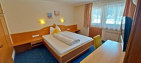 Three-Bedroom Apartment with Balcony