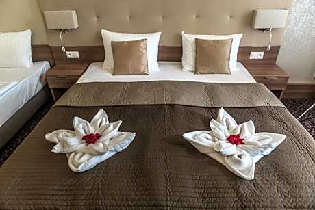 Triple Room Premium (Included access to the pools)