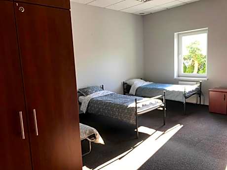 Single Bed in Dormitory Room