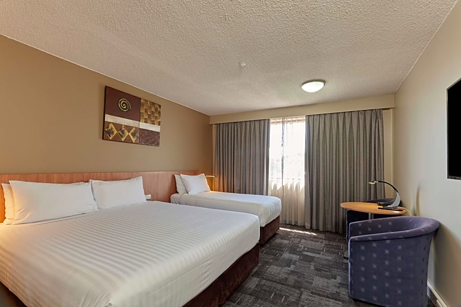 Photo 1 of 9 of Deluxe 1 King Bed and 1 Twin Bed, Bathtub