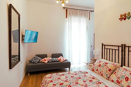 Quadruple Room with Private Bathroom