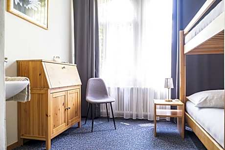 Economy Quadruple Room with Shared Bathroom
