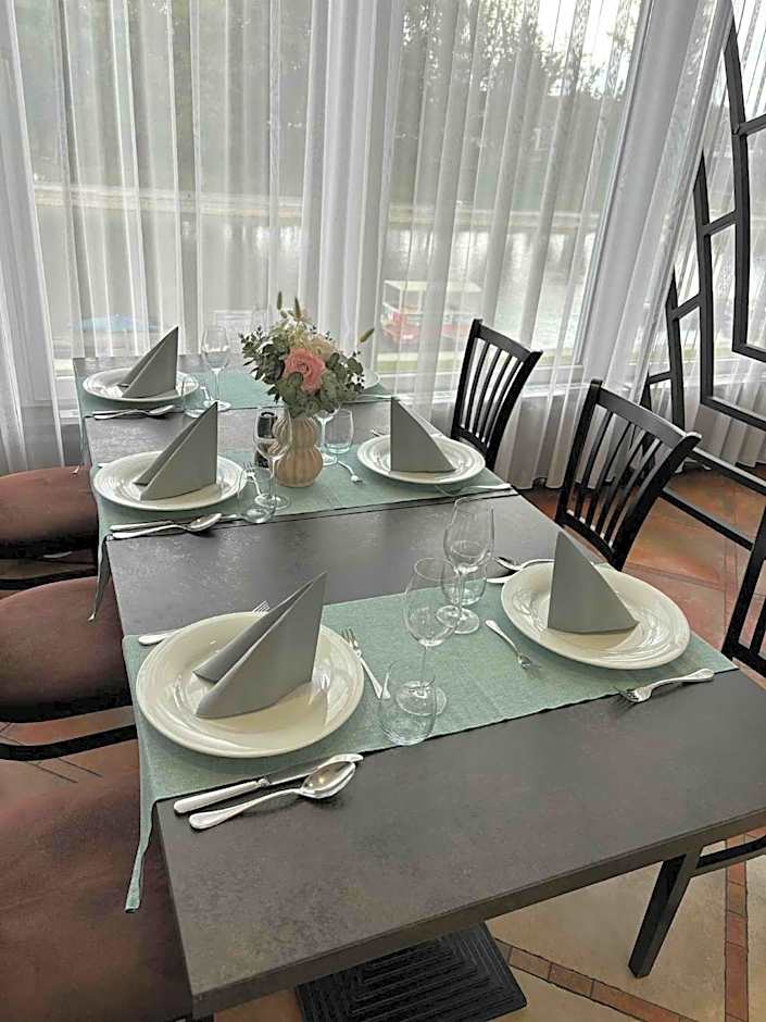 Amstel Hattyú Panzió -Érintésmentes bejelentkezés