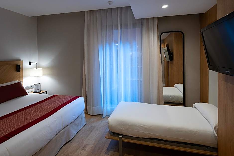 Photo 1 of 5 of Triple Room - 2 Adults and 1 Child