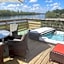 Award winning Serenity Lodge with outstanding lakeside views from the hot tub , at Tallington Lakes Leisure Park, Stamford