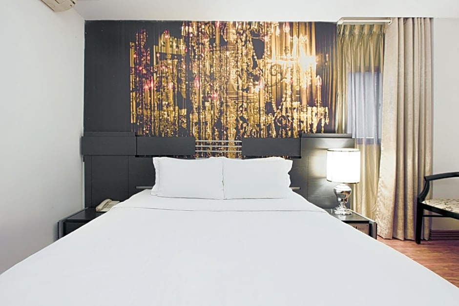 A & Em Corp - The Petit Hotel