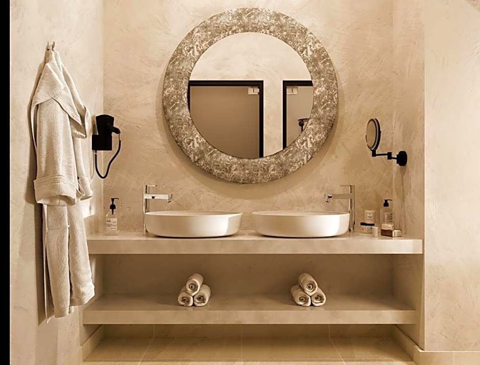 Delfini Beach Hotel & Suites