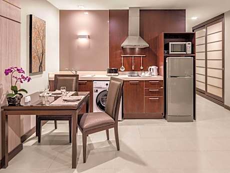 Deluxe King Suite with Living Room and Balcony