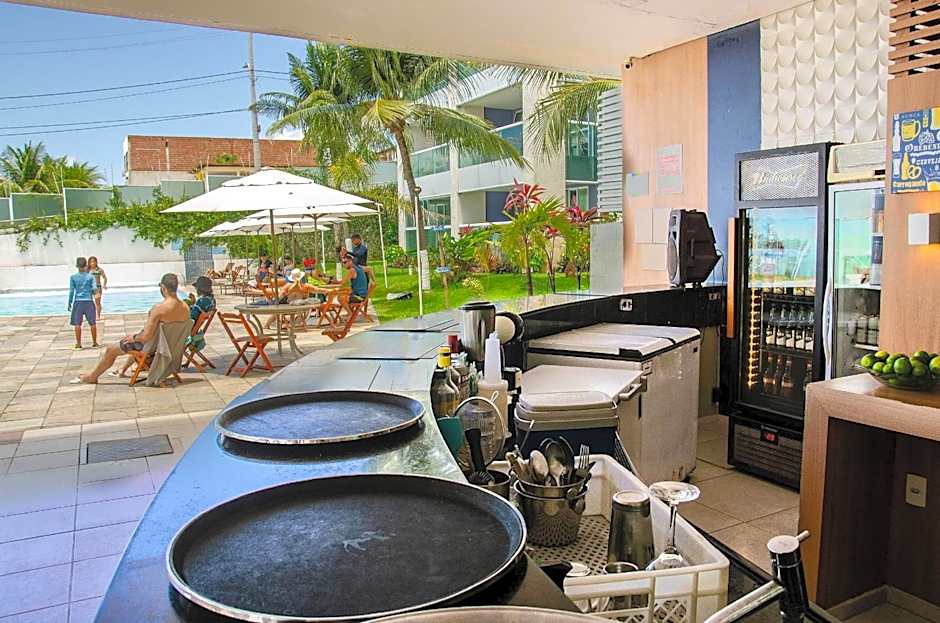 Suíte PÉ NA AREIA com PISCINA, WIFI e ESTACIONAMENTO em PONTA NEGRA