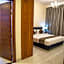 OYO 104 Q House 3 Apartments