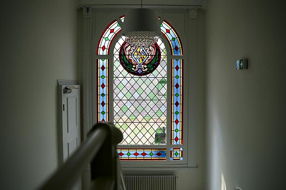 Hôtel Échappée en Baie - Parking privé gratuit dont forfaits bornes électriques réservable