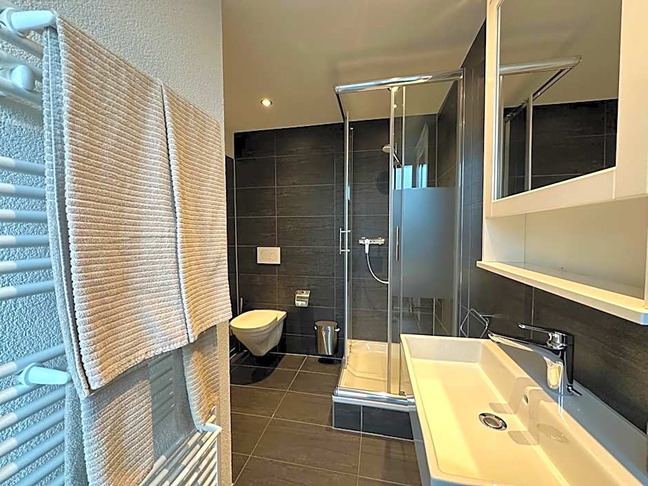 Boutique Hotel Niesenblick - direkt am Thunersee gelegen mit SELF CHECK IN & digitaler Rezeption