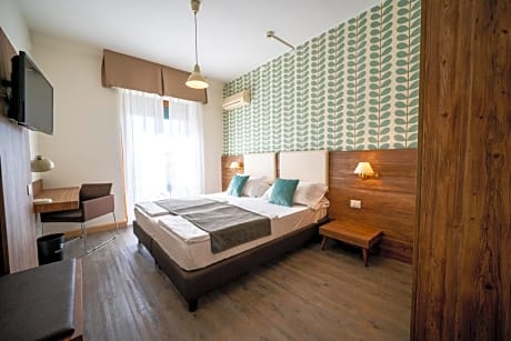 Family Room (2 Adults + 2 Children) with Balcony and Parking