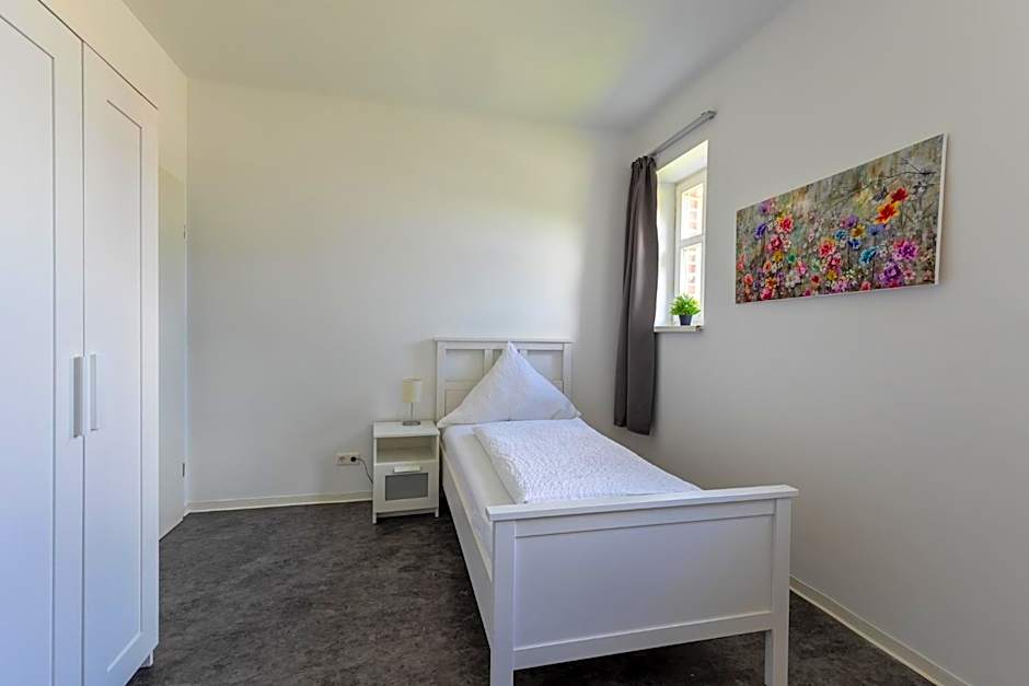 Natura Ferienhaus, Ferienwohnungen in Rhauderfehn , Komfort für Gäste & Firmen ,WLAN & Parkplatz