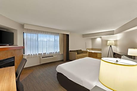 King Suite with Whirlpool and Roll-in Shower