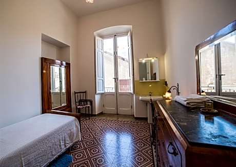 Economy Single Room with Balcony and Shared Bathroom