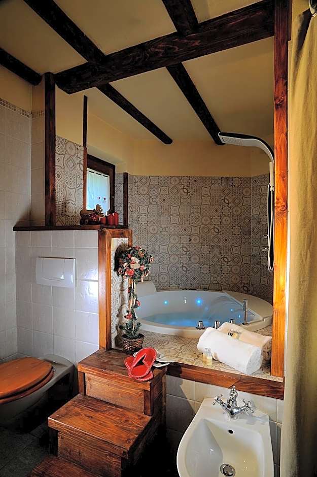 Aparthotel Foyer d'antan SUITE con caminetto hammam o vasca idromassaggio