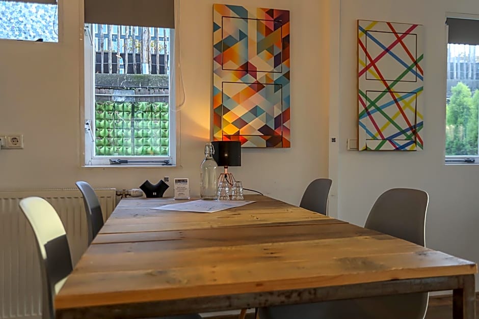 HouseBoat next to AMSTEL