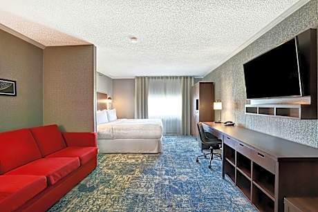 Larger Superior King Room with Airport View, City View and Sofa Bed