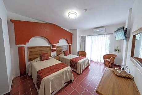 Tradicional 2 camas individuales con balcon vista ciudad