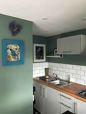 One-Bedroom Apartment with Garden View