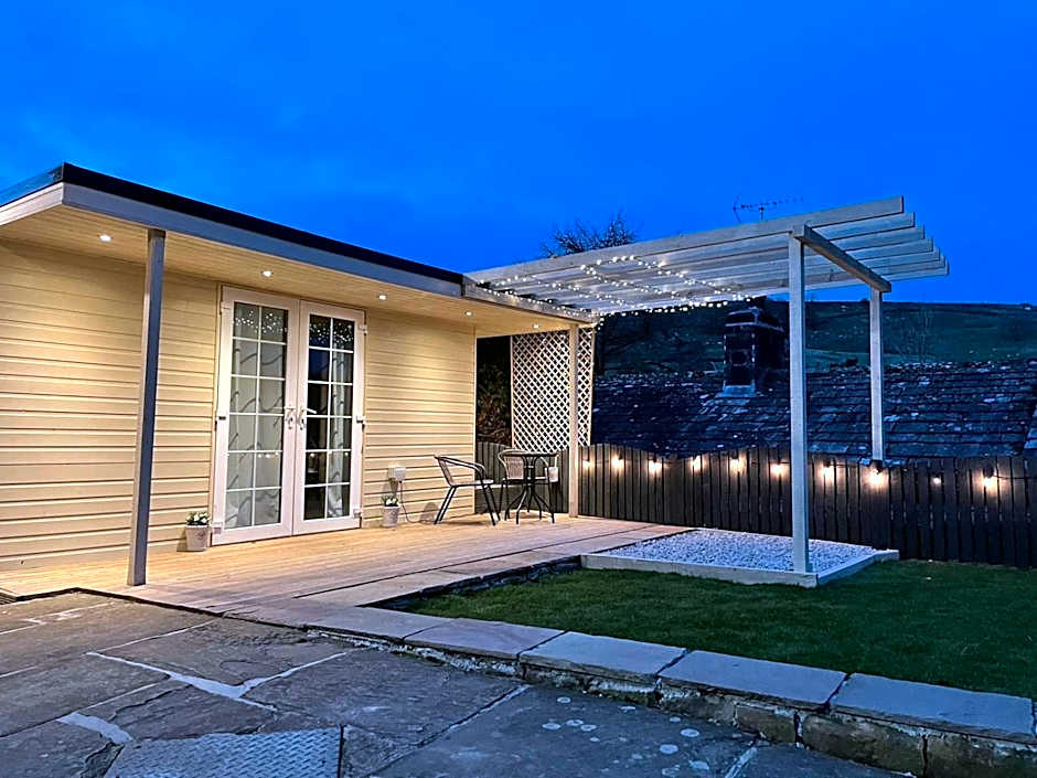 Apple tree hut, in a private garden