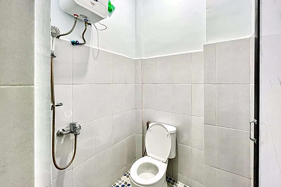 RedDoorz @ MG House Siantar Timur