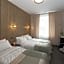Happy Inn Rooms & Suites