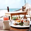 Petit Lafitte Beach Front Hotel & Bungalows