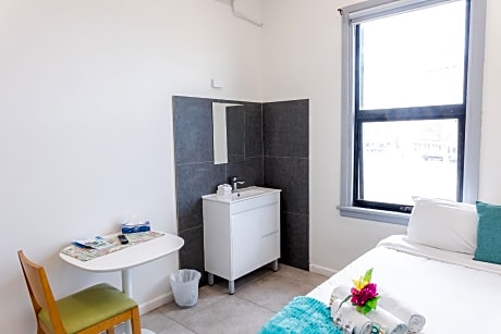 Queen Room with Shared Bathroom