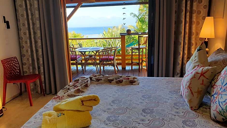 Poz Lagon - chambre d'hôtes - Bungalow pour 2 personnes - Jacuzzi privatif - petit déjeuner - Vue sur le lagon