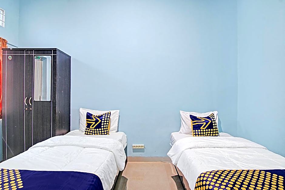 Hotel O Penginapan Puti SyariahNearBandara Sultan Syarif Kasim II