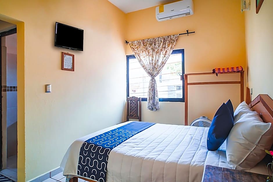 Capital O Hotel Aurora