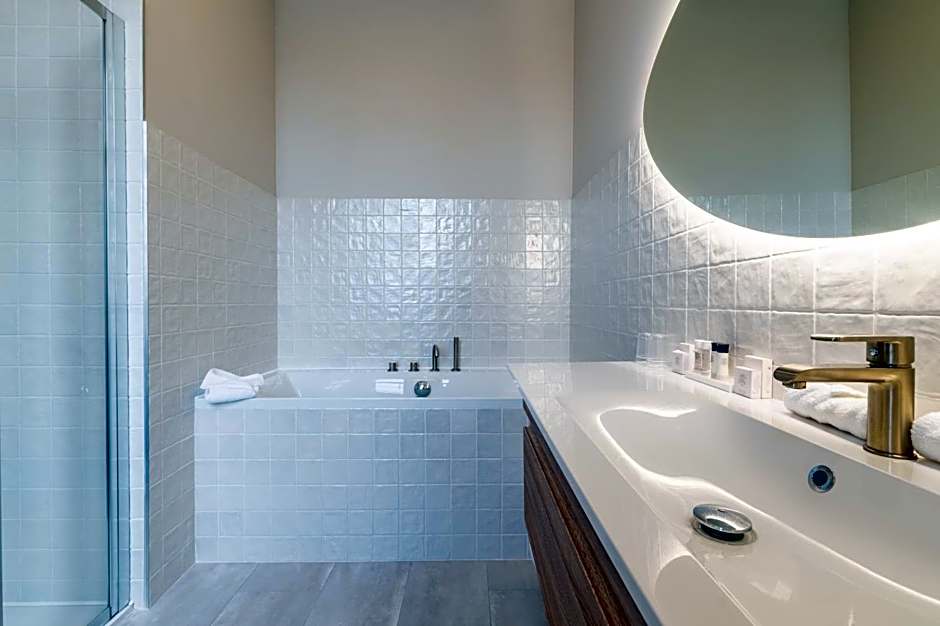 Hôtel Échappée en Baie - Parking privé gratuit dont forfaits bornes électriques réservable