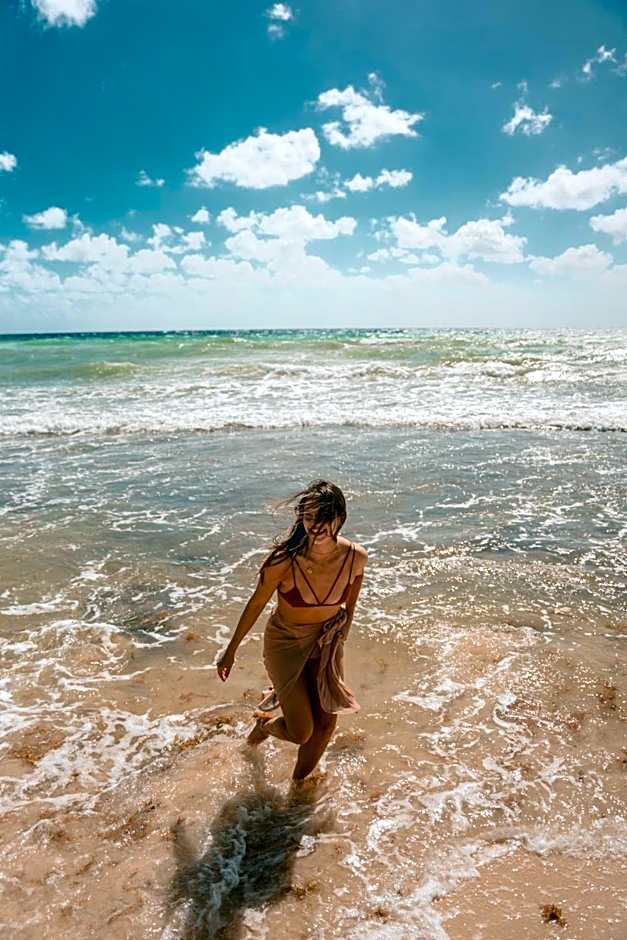 Petit Lafitte Beach Front Hotel & Bungalows