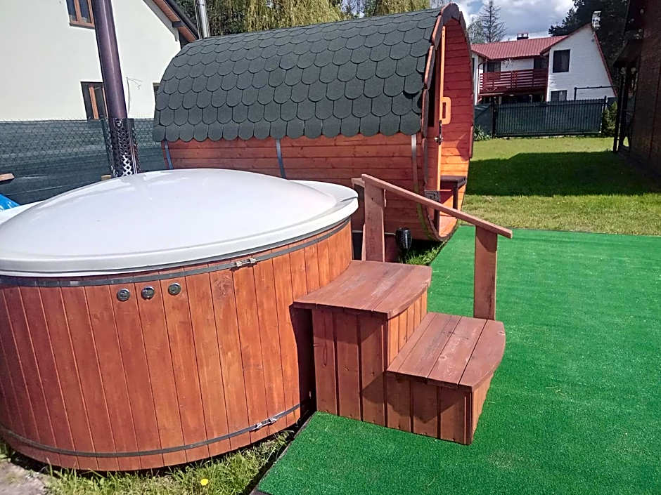 Domki i pokoje ,,Pod Palmami" w centrum