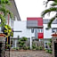 Capital O 91665 D'prof Exclusive Guesthouse