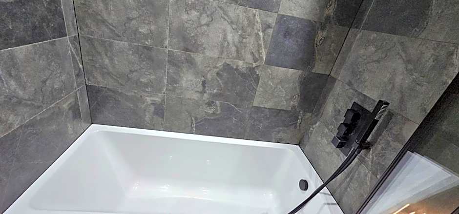 Under New Top Rated Management I Stylish 2BR Apartments I Central Hub I Free Parking I Work Ready Amenities