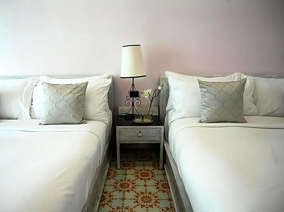 Photo 1 of 22 of Deluxe 1 Twin Bed, Pool View