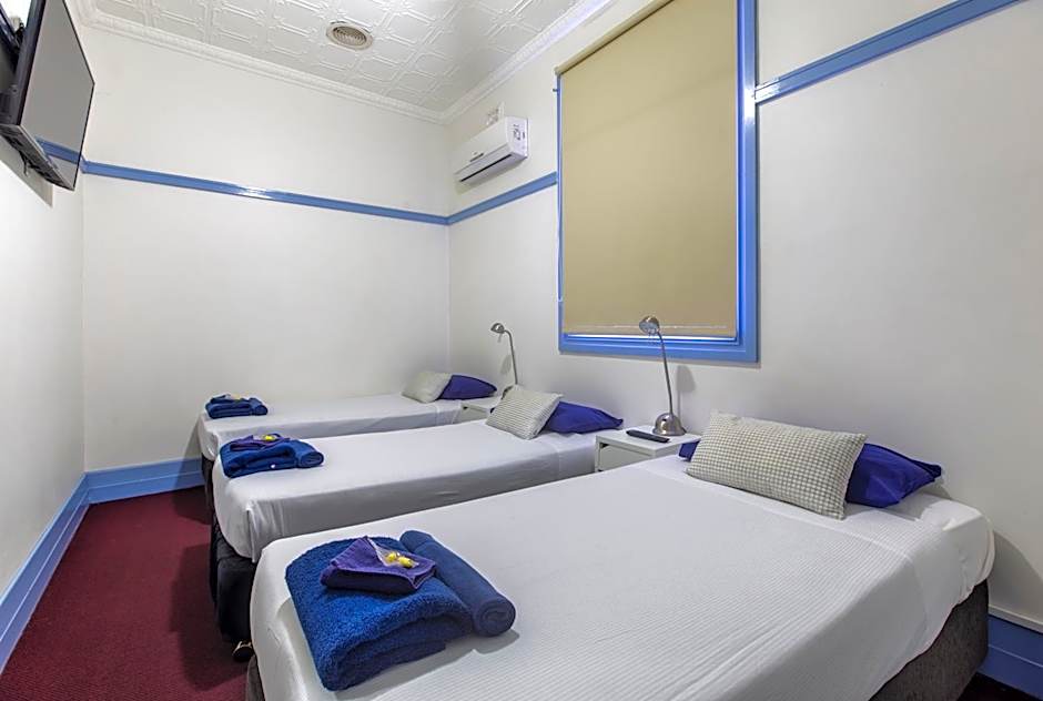 Photo 1 of 2 of Triple Room with Shared Bathroom